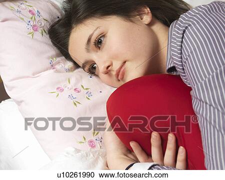 Girl, 14 with head on pillow View Large Photo Image Stock Image - Girl, 14 with head on pillow. Fotosearch