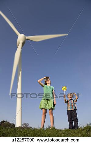 girl and boy at Wind Turbines View Large Photo Image Stock Image - girl and boy at Wind Turbines. Fotosearch