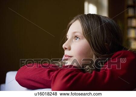 Stock Photo - girl daydreaming. Fotosearch