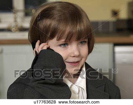 girl dressed as fathers clothes View Large Photo Image Stock Photo - girl dressed as fathers clothes. Fotosearch