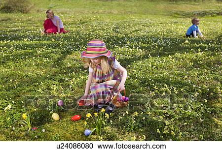 girl finding easter eggs View Large Photo Image Stock Image - girl finding easter eggs. Fotosearch