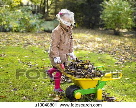 Girl gardening View Large Photo Image Stock Image - Girl gardening. Fotosearch
