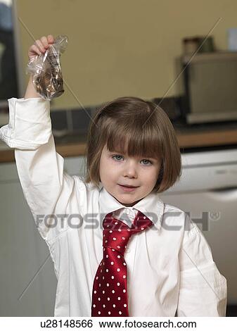 girl holding bag of coins View Large Photo Image Stock Photograph - girl holding bag of coins. Fotosearch