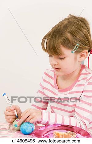 girl painting eggs for easter View Large Photo Image Stock Photograph - girl painting eggs for easter. Fotosearch