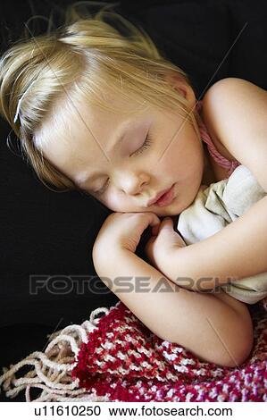 Stock Image - Girl sleeping. Fotosearch