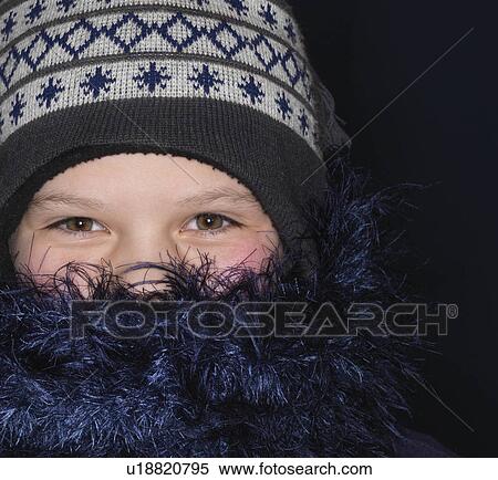 Girl wearing hat and scarf, close-up View Large Photo Image Stock Photography - Girl wearing hat and scarf, close-up. Fotosearch