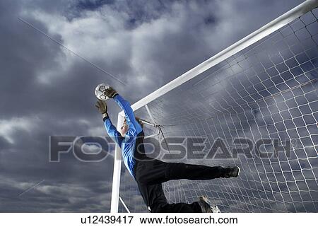 goalkeeper diving View Large Photo Image Stock Photo - goalkeeper diving. Fotosearch