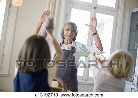 grandmother and grandchildren playing View Large Photo Image Stock Image - grandmother and grandchildren playing. Fotosearch