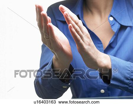 Hands of a woman, applauding View Large Photo Image Stock Image - Hands of a woman, applauding. Fotosearch