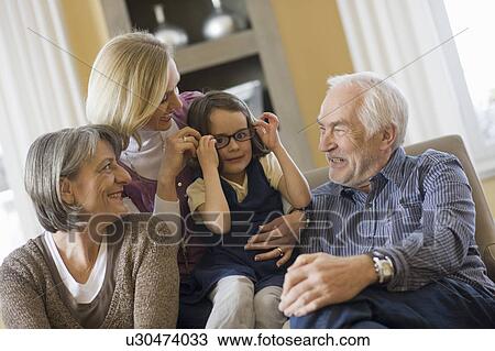 happy family sitting together View Large Photo Image Stock Image - happy family sitting together. Fotosearch