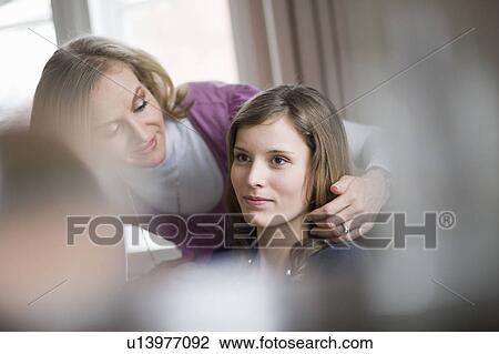 happy mother and daughter preparing View Large Photo Image Stock Image - happy mother and daughter preparing. Fotosearch