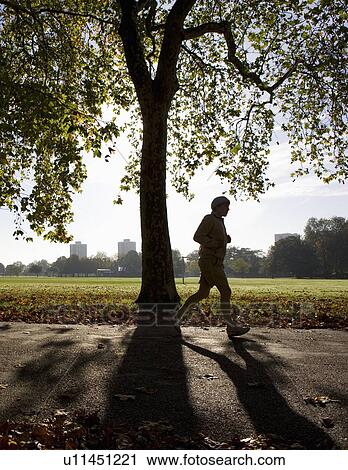 Stock Image - Jogging through London. Fotosearch