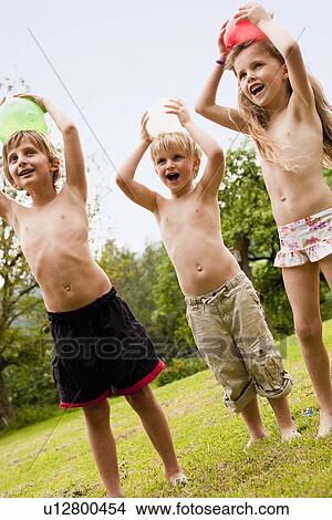 Kids Playing in Garden View Large Photo Image Picture - Kids Playing in Garden. Fotosearch