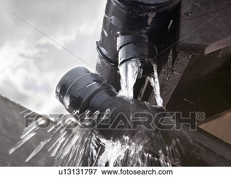 Stock Photo - Leaking gutter. Fotosearch