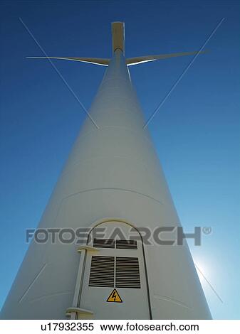 Low angle view of wind turbine View Large Photo Image Stock Photography - Low angle view of wind turbine. Fotosearch
