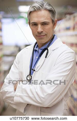 Male Doctor smiling View Large Photo Image Stock Image - Male Doctor smiling. Fotosearch