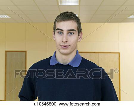 Stock Image - male staff at gym. Fotosearch