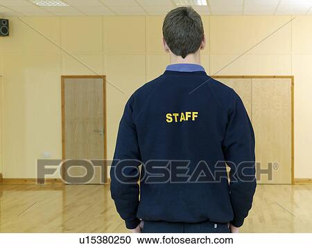 Stock Image - male staff at gym. Fotosearch