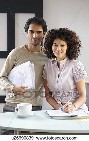 Man and woman in office cafe View Large Photo Image Stock Photo - Man and woman in office cafe. Fotosearch