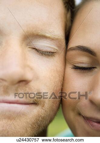 Man and Woman Touching Cheeks View Large Photo Image Stock Photo - Man and Woman Touching Cheeks. Fotosearch