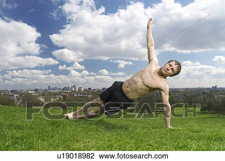 man doing side plank View Large Photo Image Stock Image - man doing side plank. Fotosearch