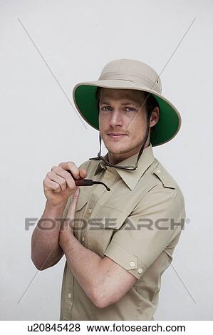 man in jungle outfit looking at viewer View Large Photo Image Stock Photo - man in jungle outfit looking at viewer. Fotosearch