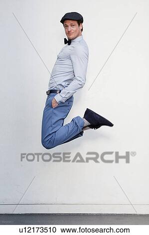 man jumping in the air View Large Photo Image Stock Image - man jumping in the air. Fotosearch