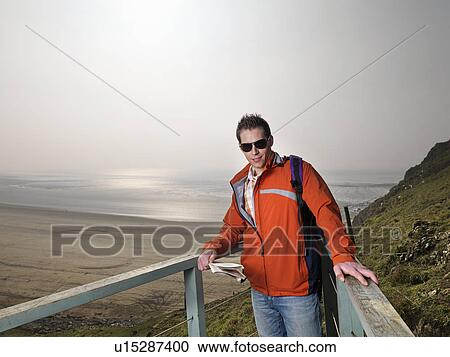 Stock Image - man on hike. Fotosearch
