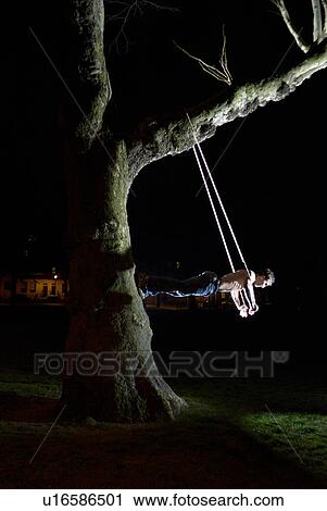 man on rope from tree View Large Photo Image Stock Image - man on rope from tree. Fotosearch