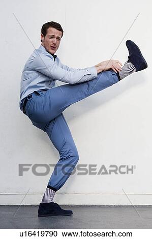 man playing with legs View Large Photo Image Stock Image - man playing with legs. Fotosearch