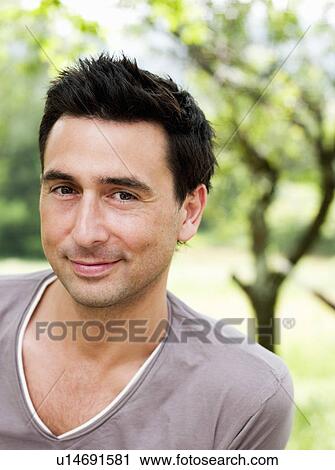 Man Portrait in Garden View Large Photo Image Stock Image - Man Portrait in Garden. Fotosearch