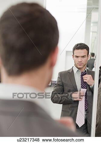 man shopping comparing ties View Large Photo Image Stock Photo - man shopping comparing ties. Fotosearch