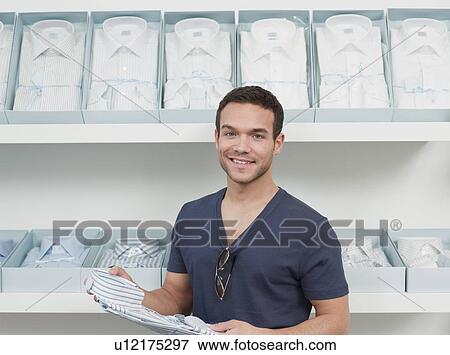 man shopping looking at viewer View Large Photo Image Stock Photo - man shopping looking at viewer. Fotosearch