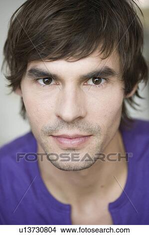 Picture - Man smiling at viewer. Fotosearch
