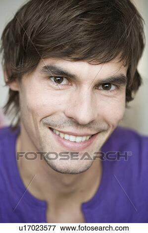 Man smiling at viewer View Large Photo Image Stock Photo - Man smiling at viewer. Fotosearch