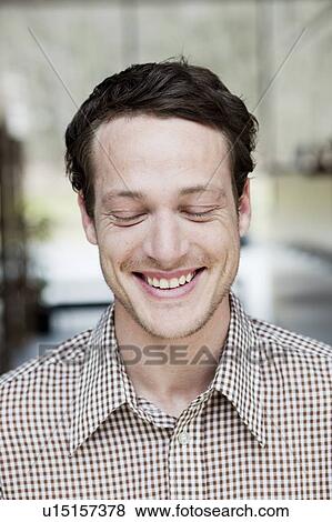 man smiling eyes closed View Large Photo Image Stock Photo - man smiling eyes closed. Fotosearch