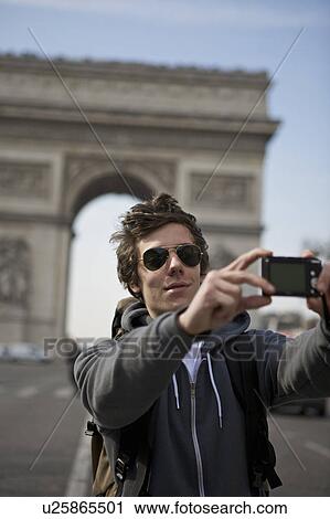 Man taking self portrait in Paris View Large Photo Image Stock Image - Man taking self portrait in Paris. Fotosearch