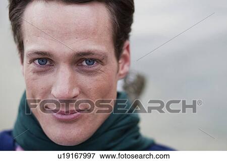 man with scarf looking at viewer View Large Photo Image Stock Photo - man with scarf looking at viewer. Fotosearch