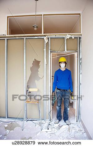 Man with tools and hard hat View Large Photo Image Stock Photo - Man with tools and hard hat. Fotosearch