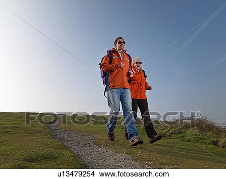 man & woman hiking View Large Photo Image Picture - man & woman hiking. Fotosearch