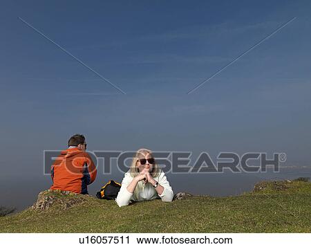 man & woman resting on hike View Large Photo Image Stock Image - man & woman resting on hike. Fotosearch