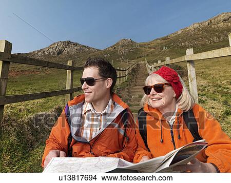 man & woman studying map View Large Photo Image Picture - man & woman studying map. Fotosearch