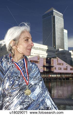 mature lady with medal View Large Photo Image Stock Image - mature lady with medal. Fotosearch