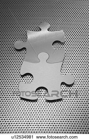 Metal jigsaw puzzle pieces View Large Photo Image Stock Image - Metal jigsaw puzzle pieces. Fotosearch