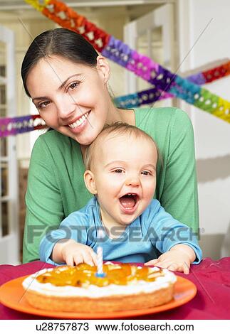 Mother and baby boy, celebrating View Large Photo Image Stock Image - Mother and baby boy, celebrating. Fotosearch