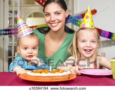 Mother and children, celebrating View Large Photo Image Picture - Mother and children, celebrating. Fotosearch