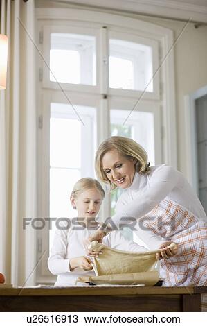 mother and daughter cooking View Large Photo Image Stock Image - mother and daughter cooking. Fotosearch