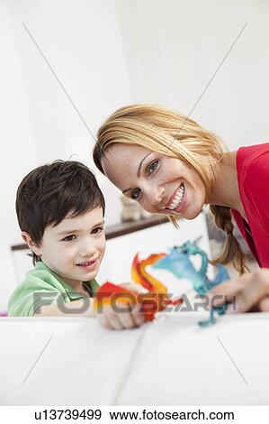 mother and son playing View Large Photo Image Stock Photo - mother and son playing. Fotosearch
