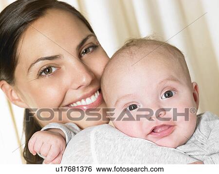 Mother with her baby-boy, smiling View Large Photo Image Stock Photograph - Mother with her baby-boy, smiling. Fotosearch