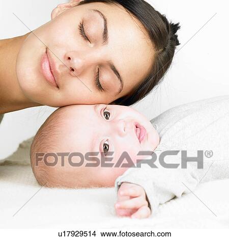 Picture - Mother with her baby. Fotosearch